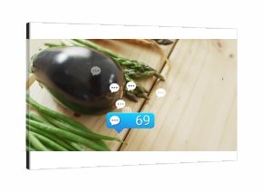 Showing eggplant, asparagus and beans on kitchen counter, chat bubbles, blue 69 bubble, copy space