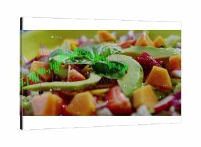 Showing avocado and strawberry salad under candlestick overlay, marking time and arrows in studio