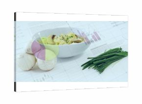 Displaying white bowl of mushroom pasta on white tabletop with mushrooms, chives and chart overlays