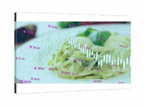 Presenting plate of pesto linguine and basil on wooden table, grid and candlestick bars, timestamps