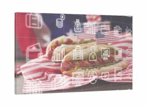 Showing sandwich sitting on red-and-white striped cloth, merging tech icons and blurred red top