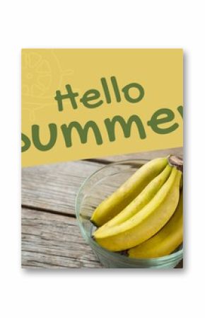 Composite of hello summer text and fresh bananas in glass bowl on wooden table, copy space