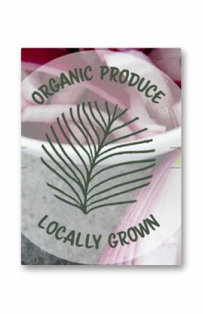 Image of organic produce locally grown text banner over bowl of chopped onions on grey surface