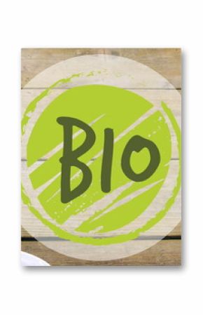 Image of bio text banner against bowl of fruit salad on wooden table