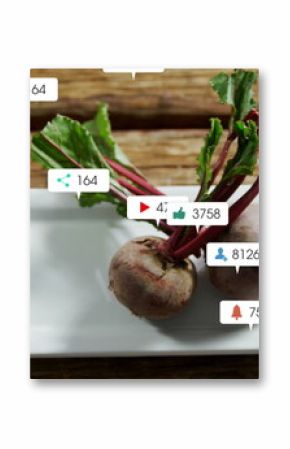 Image of social media icons foating against close up of beetroot and sliced beetroot in a plate