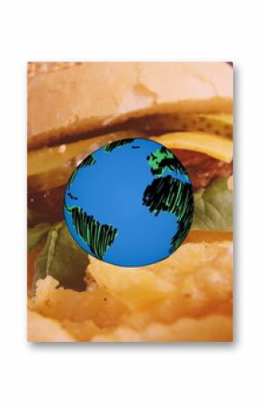 Image of globe icon over fast food with hamburger, chips and onion rings