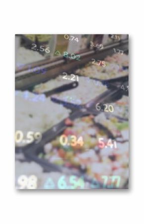 Image of financial data processing over food in restaurant