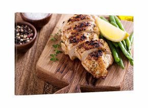 Grilled chicken on a cutting board