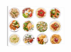 various plates of food isolated on white background, top view