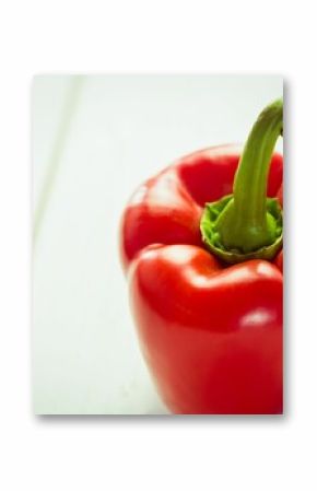 Fresh red pepper on wooden table