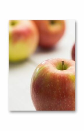 Fresh red apples on wooden table