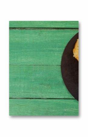 Fresh food on green wooden table