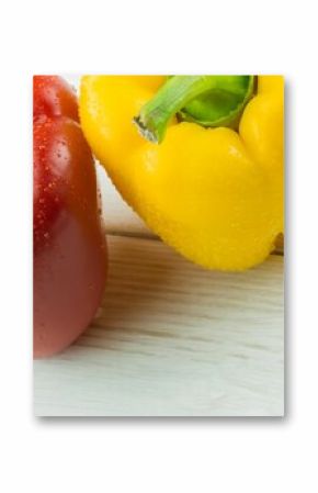 Fresh bell peppers on chopping board
