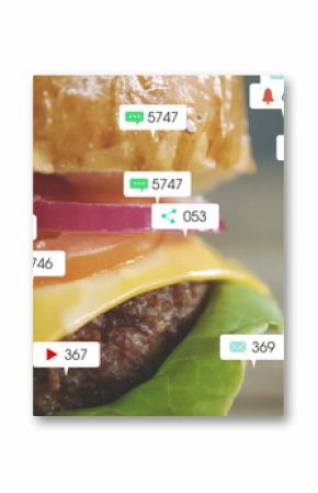 Floating social media icons circling cheeseburger on restaurant table, with engagement counters