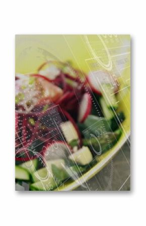 Displaying vibrant salad with cucumber slices in bowl on wooden table beside jar with data overlays