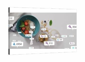 Showing bowl holding yogurt and granola on table, jar, bottle with straw, overlay icons, copy space