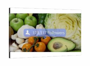 Displaying blue overlay showing follower count on wooden countertop, with green apples and avocado