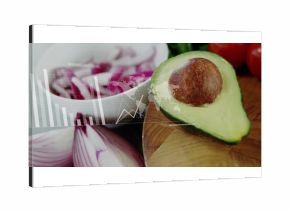 Displaying halved avocado on kitchen cutting board with red onion slices and data overlay