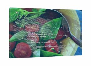 Showing wooden salad bowl with halved cherry tomatoes, basil, spoon on blue table, digital overlay