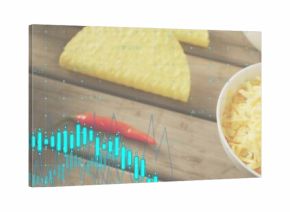 Showing white bowl of cheese on wooden board, tortilla chip, chili, slaw, blue overlay, copy space