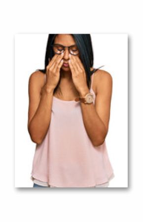 Young african american woman wearing casual clothes and glasses rubbing eyes for fatigue and headache, sleepy and tired expression. vision problem