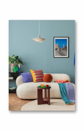 Modern and colorful interior of living room with design boucle sofa, mock up poster, shelf, plants, decorations and personal stuff. Home decor.