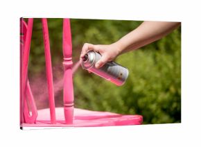 Spray paint an old chair pink