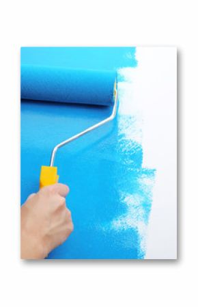 Decorator's hand painting wall with roller