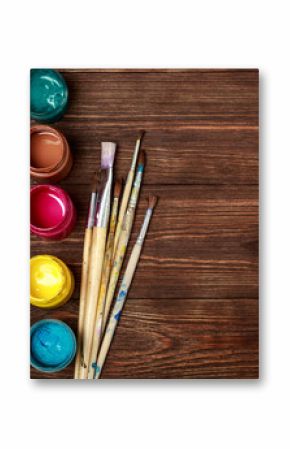 Art and craft tools.Artist's brush, canvas. Wooden art palette with tubes of acrylic paints.Artist's workshop.Art picture with copy space and for add text.Artist workplace background.Paints brushes   