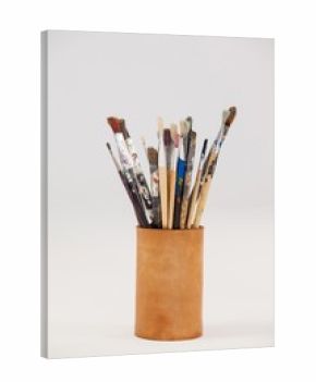 Varieties of paint brushes in jar