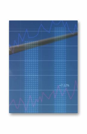 Image of financial graphs over wind turbine
