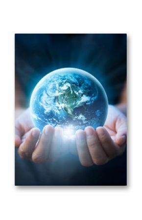 Earth day, Human hands holding blue earth, save earth concept. Elements of this image furnished by NASA