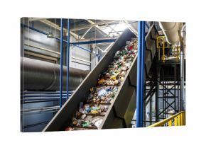 moving conveyor transporter on Modern waste recycling processing plant. Separate and sorting garbage collection. Recycling and storage of waste for further disposal.