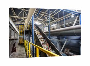 moving conveyor transporter on Modern waste recycling processing plant. Separate and sorting garbage collection. Recycling and storage of waste for further disposal.