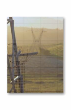 Image of data processing over modern building and pylons