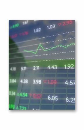 Image of financial data and graphs over solar panels
