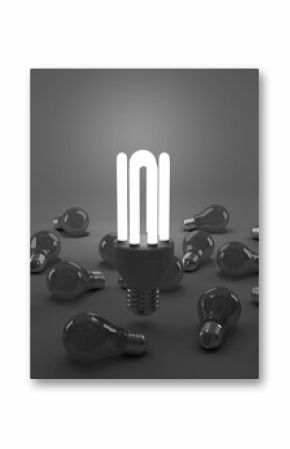 Digital composite image of illuminated energy efficient lightbulb over bulbs