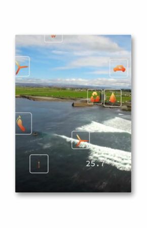 Showing surf zone cresting white-capped waves at coastal region, with data overlay icons