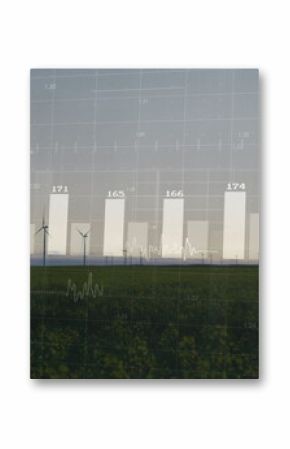 Showing large wind turbine spinning over green crops on farmland, with metric overlays, copy space