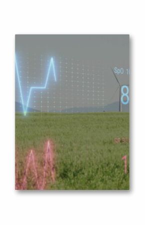 Projecting holographic ECG, SpO2 and PR readings over grass field at horizon, with wind turbines