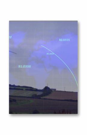 Overlaying digital grid and trajectory lines over white wind turbine and farmland, copy space
