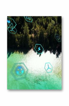 Floating digital icons drifting over pine forest at turquoise lake, showing energy symbols