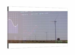 Displaying single large wind turbine standing over grassland with overlaid stock charts, copy space