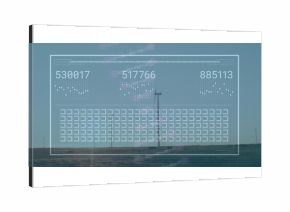 Displaying translucent interface overlaying grassy plain with turbines, with readouts and graphs