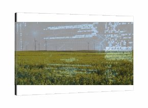 Rotating wind turbines generating energy over yellow flowering crops in farmland, with code overlay