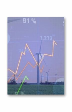 Displaying large wind turbine standing in green crop field at dusk, with financial data overlays