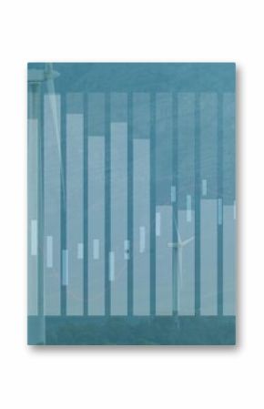 Towering white wind turbine rising in mountain valley, with financial charts overlay, copy space