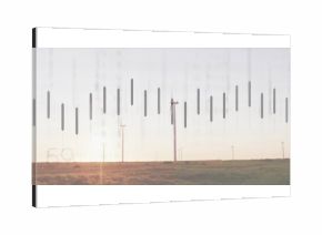 Dominating tall wind turbine rising on grassy scrubland at sunset, highlighting data bars overlay