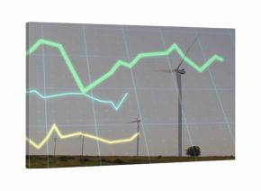 Showing dominant turbine rising over grass plain with grid and colored graphs, copy space