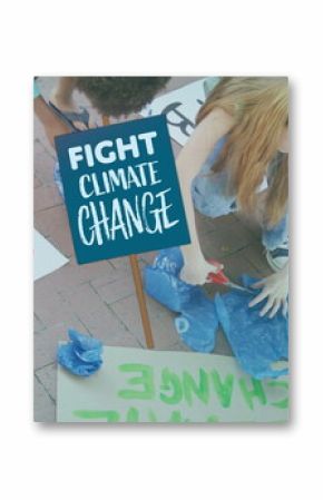 Image of fight climate change placard over diverse children making ecology protest banners